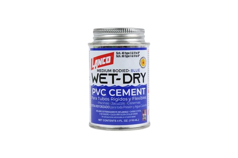 Pegamento cemento PVC Wet Dry azul Lanco de 4 onzas, envase metálico cilíndrico con etiqueta blanca y azul