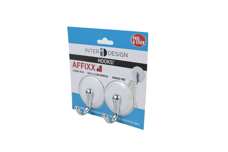 Set colgador pared adhesivo 2 piezas Affix Interdesign blanco, empaque comercial con los dos ganchos y soporte de cartón