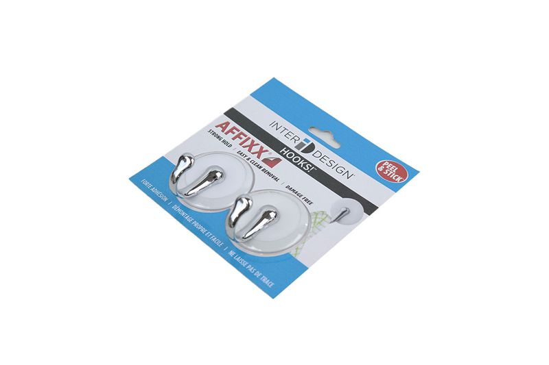 Set colgador pared adhesivo 2 piezas Interdesign blanco, producto en su empaque original azul y blanco