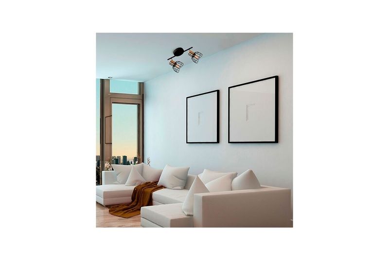 Lámpara de techo reflectora negro 2L E27 40W Sinsa, instalada en el techo de una sala con sofá blanco y cuadros