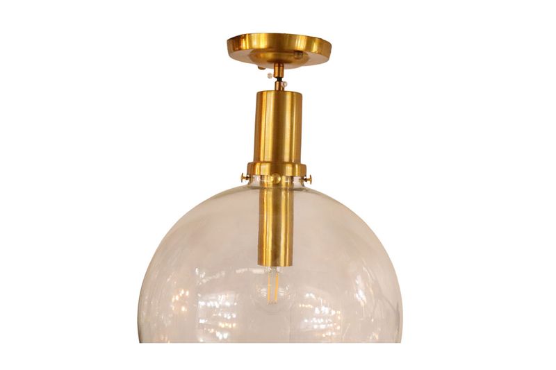 Lámpara de techo bronce dorado 1L E27 60W Ikelite, acercamiento a la base metálica y la parte superior del globo vidrio
