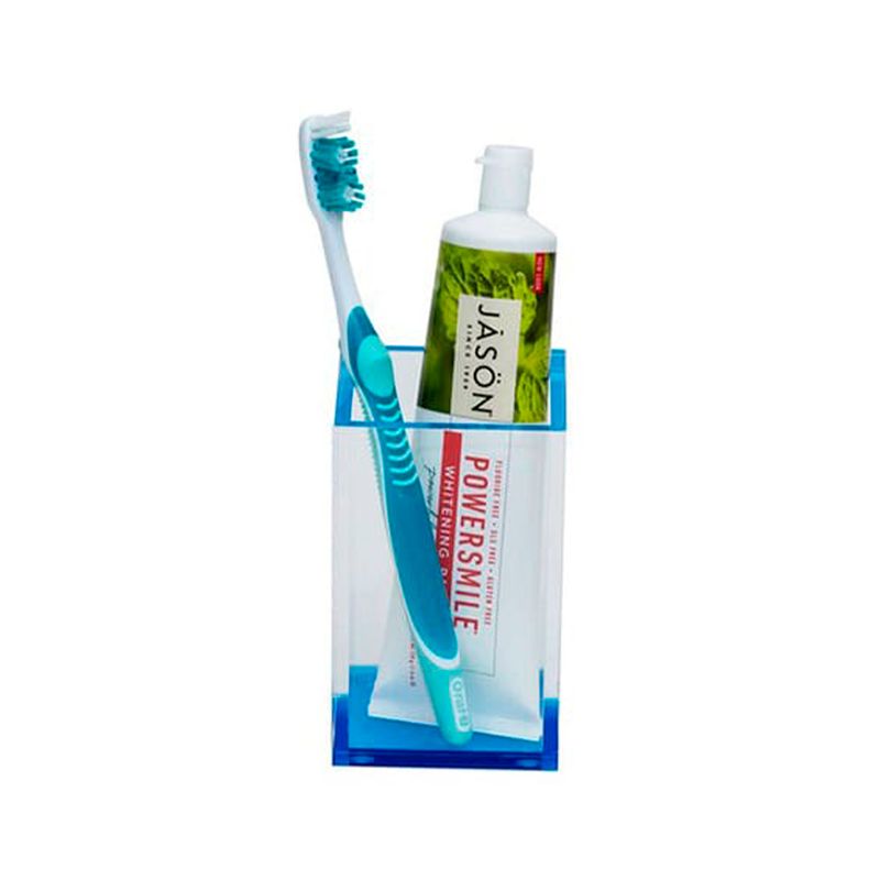 Portacepillo de dientes celeste Metropolis Sttelli, organizador con un cepillo dental azul y una crema dental blanca