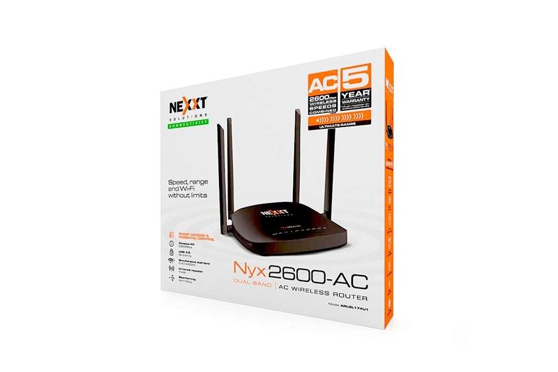 Router inalámbrico 2600 Mbps doble banda Nyx Nexxt, vista frontal de la caja blanca con imagen del equipo y detalles técnicos