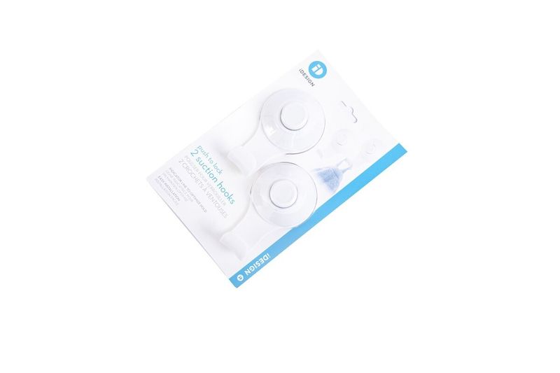 Set de ganchos de succión blanco iDesign, empaque blister con los dos ganchos y detalles del producto en inglés y francés