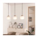 Lámpara colgante Comino 3L E27 IP20 arena Eglo, tres luminarias instaladas sobre un mueble blanco en ambiente interior