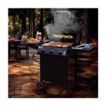 Barbacoa de gas 3 quemadores acero inoxidable negro American Gourmet Char-Broil, con carnes y mazorcas cocinándose