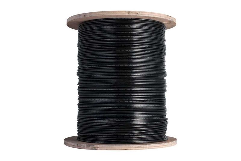 Cable THHN caja Condumex de calibre 10 negro, enrollado en un carrete de madera circular