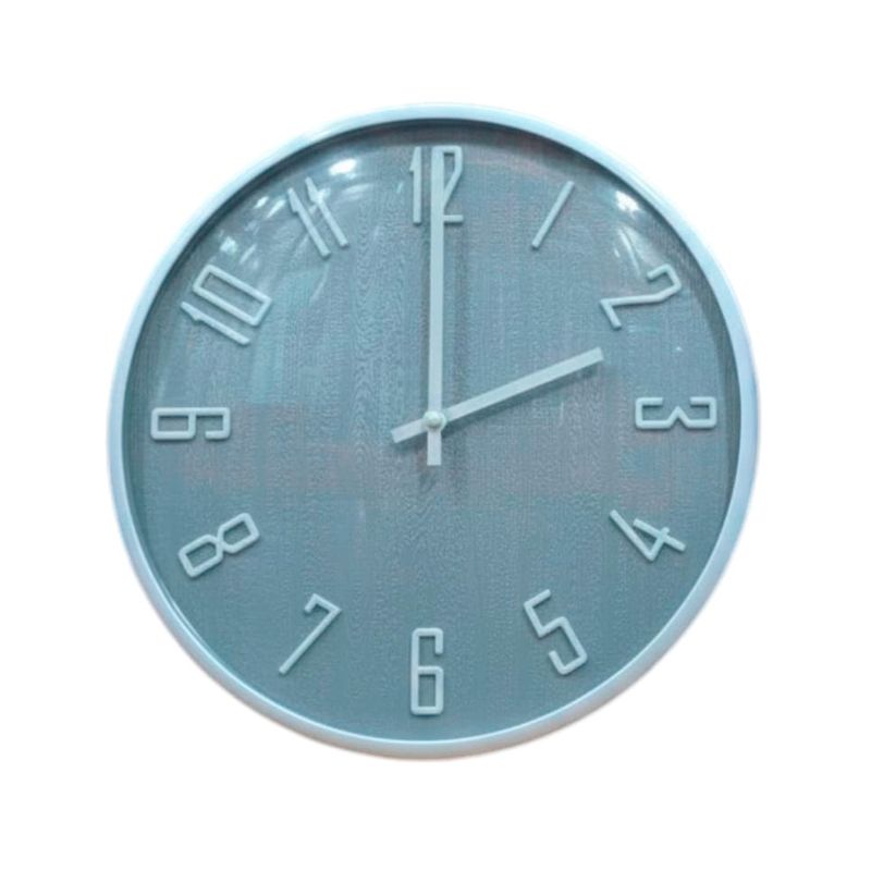 Reloj de pared 33 x 4.5 x 33 cm Concepts, vista frontal circular de color azul con números blancos resaltados