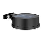Luminaria solar de pared Vynce redondo 3.3 V 1.5 W 2700 K 200 lm IP44 negro Philips, vista en ángulo con panel solar superior