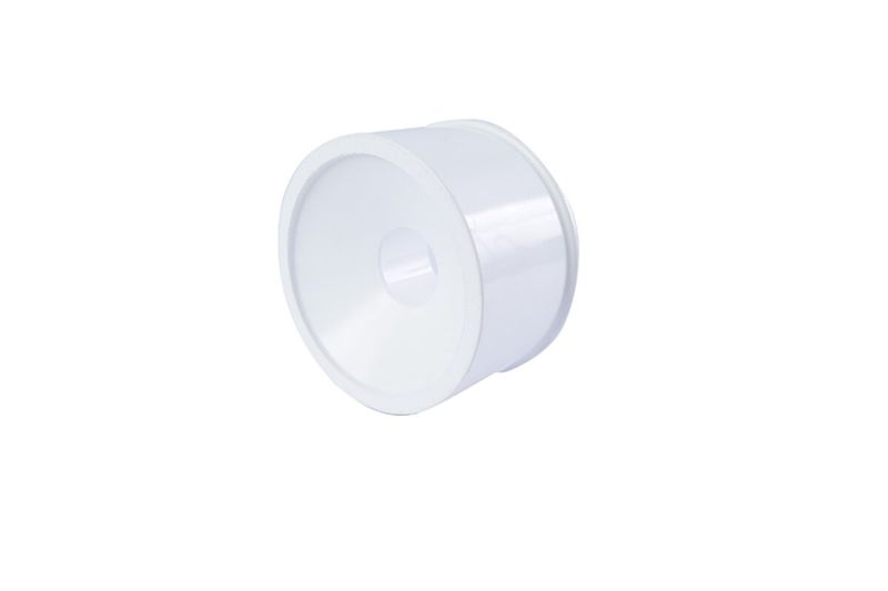 Reductor PVC liso agua potable 3"x1" Amanco, vista frontal del orificio reducido y el cuerpo blanco