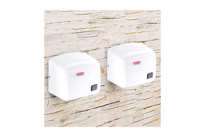 Secador de manos plástico Helvex de 1800 W, 120 V blanco, dos unidades instaladas en pared de piedra clara