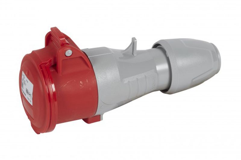 Toma industrial hembra 16 A 4 polos 380-415 V Legrand, vista lateral con tapa protectora roja y cuerpo gris