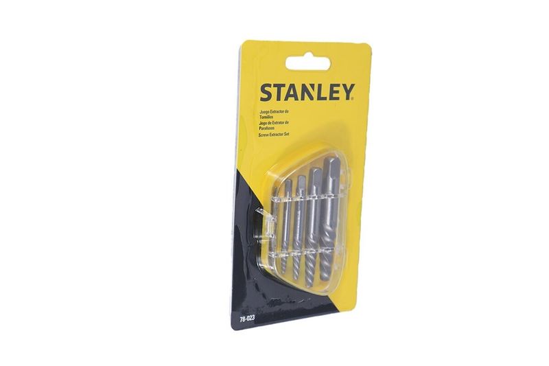 Juego extractor de tornillos Stanley de 5 piezas, visto en su empaque amarillo y negro con las piezas metálicas visibles
