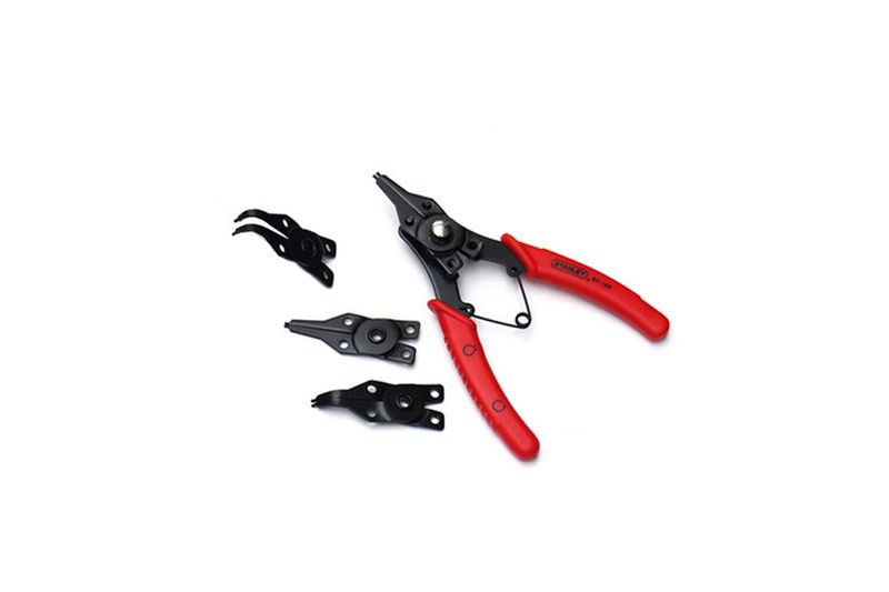 Alicates múltiples para anillos de retención de 6 pulgadas Stanley, con mangos rojos y tres puntas intercambiables negras