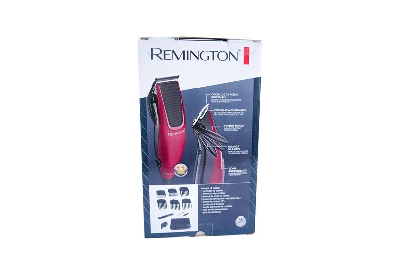 Kit de cortadora de cabello rojo de 12 piezas Remington, empaque frontal con ilustración del producto y accesorios
