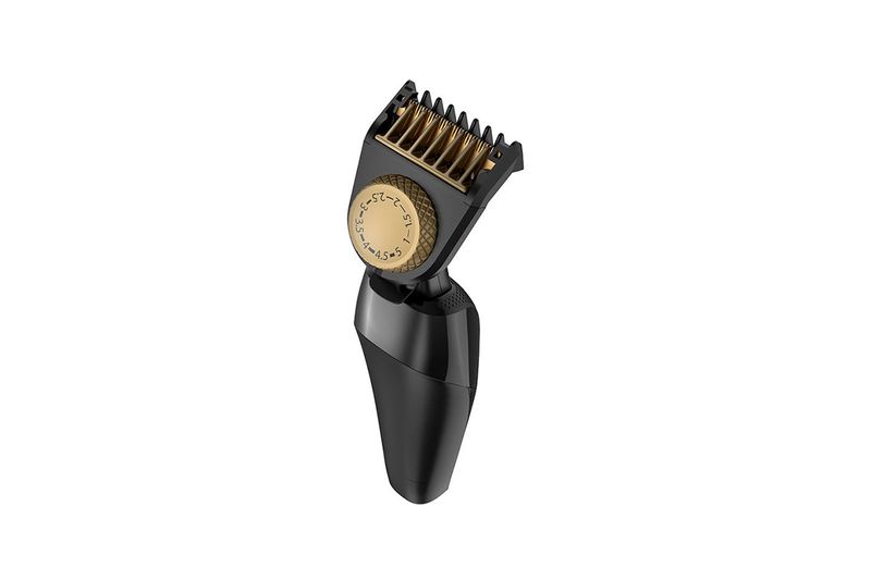 Rasuradora T-Series Remington, primer plano del cabezal con peine guía dorado y dial de ajuste de longitud