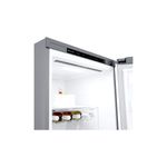 Refrigerador LG Inverter de 14 pies acero inoxidable, vista interior del refrigerador abierto con botellas en el estante