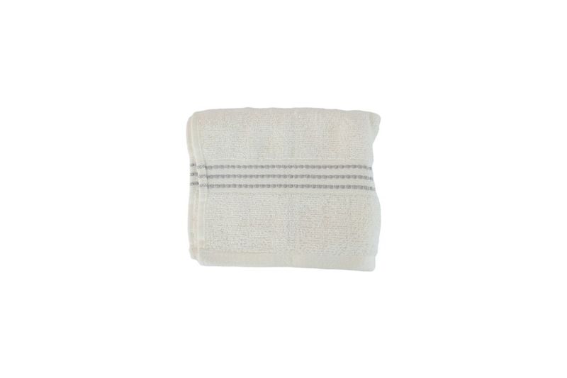 Toalla de mano tejido ladrillo blanco 16x26 Safdie, doblada mostrando la textura del tejido y líneas decorativas
