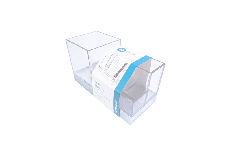 Cepillera multiespacios acrílico cromo 7.3 x 4.2 pulgadas iDesign, producto en su empaque con etiqueta azul y blanca