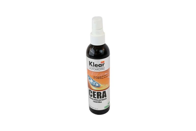Cera abrillantadora para autos Klear Sur de 240 ml líquido, botella oscura con atomizador blanco y etiqueta frontal