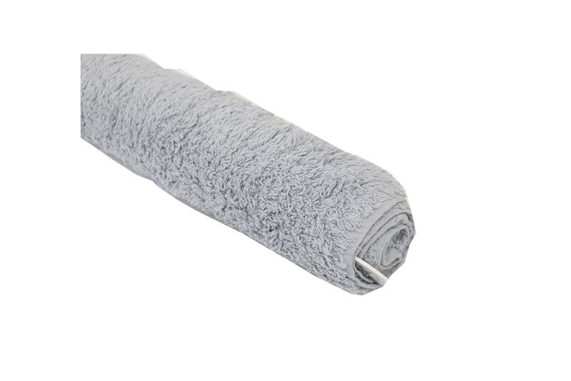 Alfombra de baño surt 60x90 cm Koopman, enrollada en color gris con textura suave