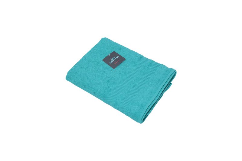Toalla 71 x 130 cm verde jad Hilasal, doblada con etiqueta negra de Home Collection en la parte superior