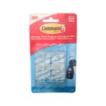 Gancho multiuso 3M de 1/2 lb y 6 piezas, en su empaque transparente con un juego de llaves como ejemplo de uso
