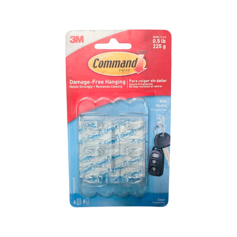 Gancho multiuso 3M de 1/2 lb y 6 piezas, en su empaque transparente con un juego de llaves como ejemplo de uso