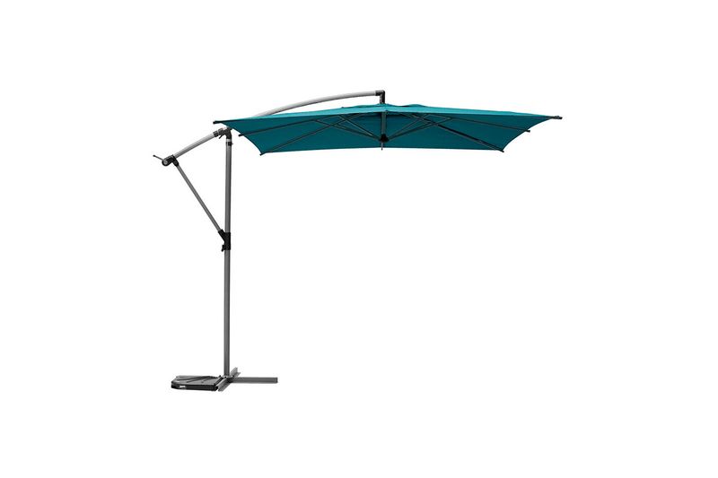 Sombrilla Manoa Peacck de 2.5 m Hespéride, abierta en color turquesa con brazo lateral y base metálica gris