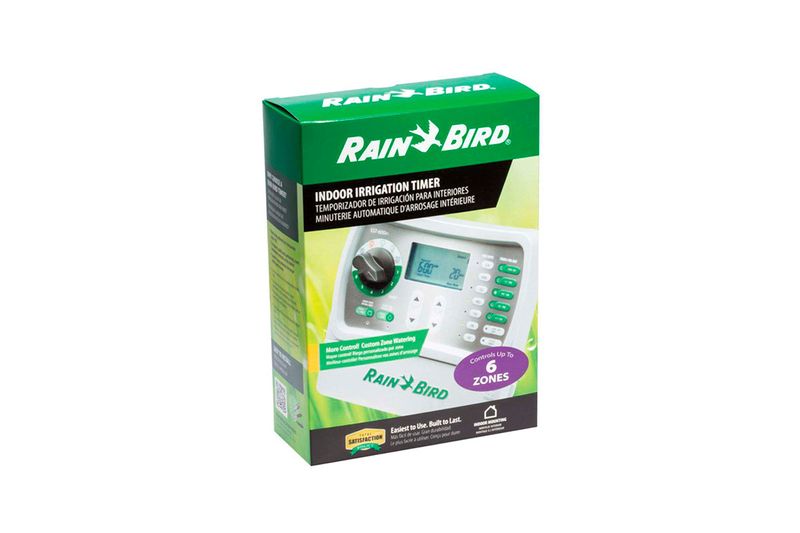 Temporizador de riego 6 zonas Rain Bird, en su caja verde con ilustración del equipo y panel de control