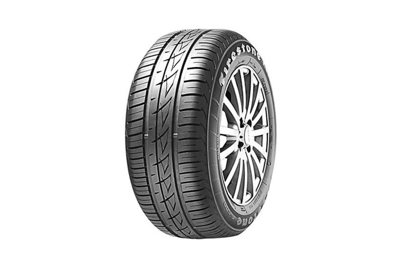 Llanta 175/70R14 F-600 84T Firestone, vista frontal del neumático montado en rin plateado con dibujo de banda de rodadura