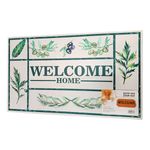 Alfombra entrada 45x75 cm Sinsa, vista frontal con diseño botánico verde y texto Welcome Home en empaque plástico