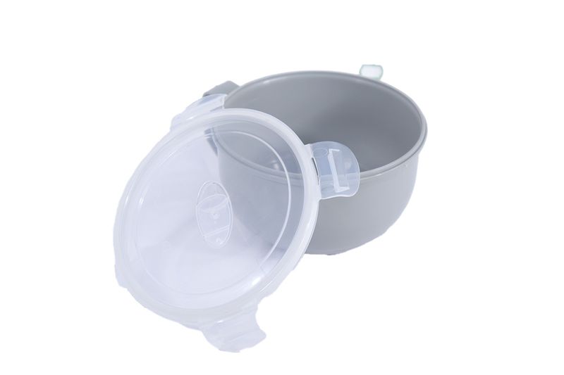 Taza microwave 1 litro Koopman, recipiente gris con su tapa plástica transparente apoyada a un lado