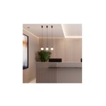 Luminaria colgante Macadamia negro 1L G9 Blumenau, tres lámparas instaladas sobre un mostrador de recepción