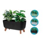 Macetera plástica 39 x 19.5 x 22 cm colores varios ProGarden, modelo negro con patas de madera y plantas verdes