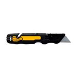 Navaja plegable DeWALT de 31 mm, vista lateral con la hoja desplegada y clip metálico en el mango negro y amarillo