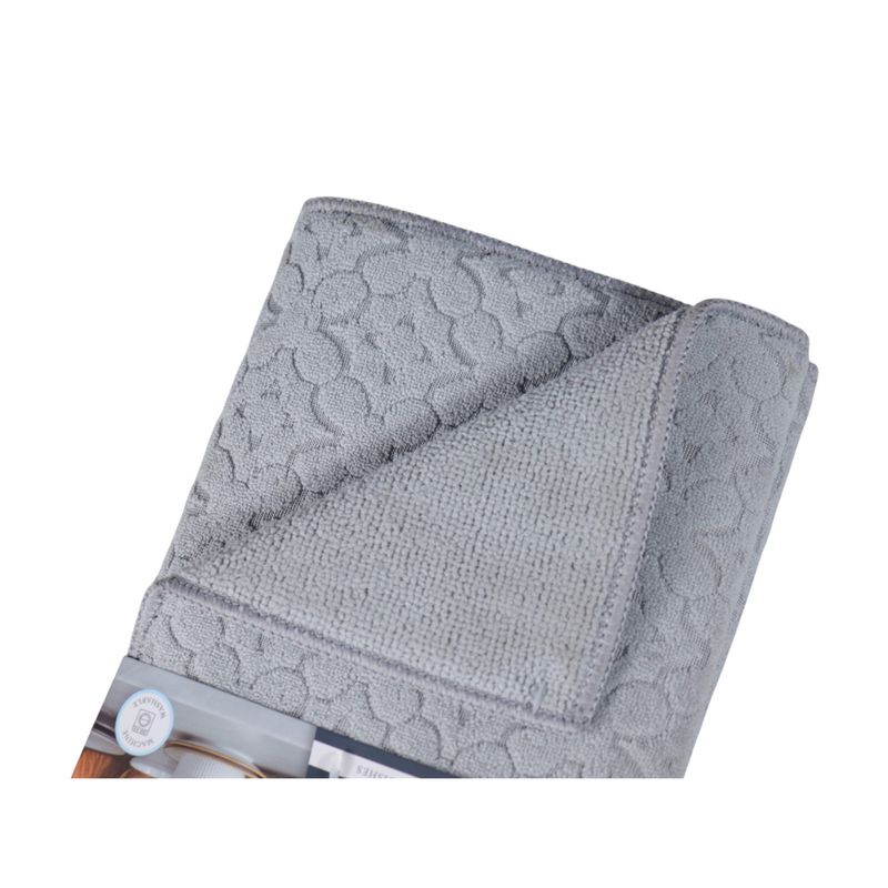 Tapete de secado para platos de microfibra 2 piezas Core Home, detalle en primer plano de la textura gris y el doblado