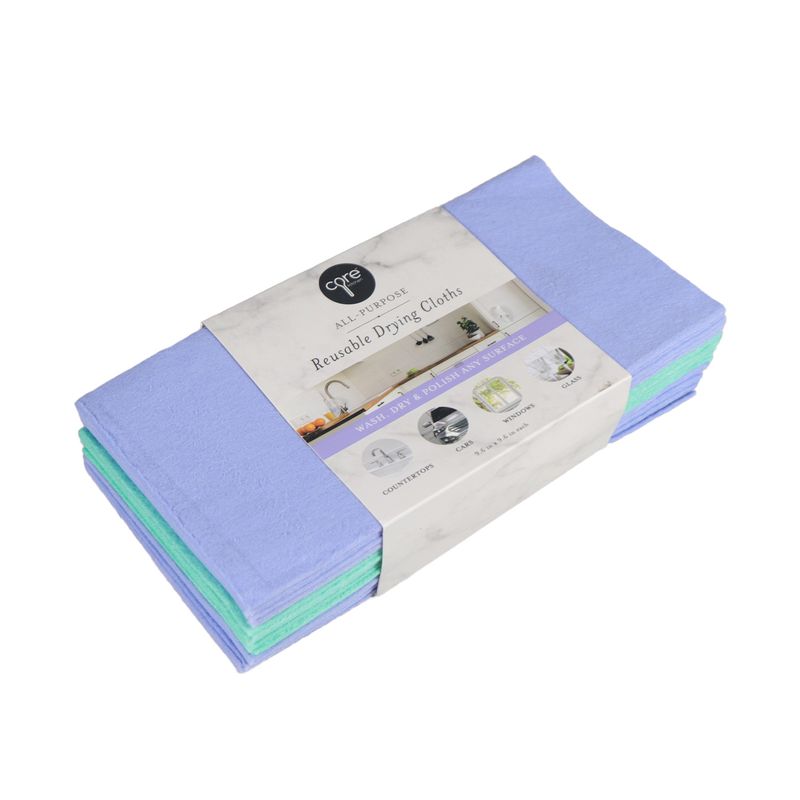 Set de toallas 15 piezas surt Core Home, paquete cerrado con toallas moradas y verdes con etiqueta blanca