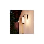 Luminaria de pared Neu Oriental 1L E27 marrón Blumenau, instalada en pared exterior encendida con luz cálida