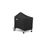 Funda para barbacoa premium/deluxe carbón negra Weber, vista lateral del producto colocado sobre la barbacoa