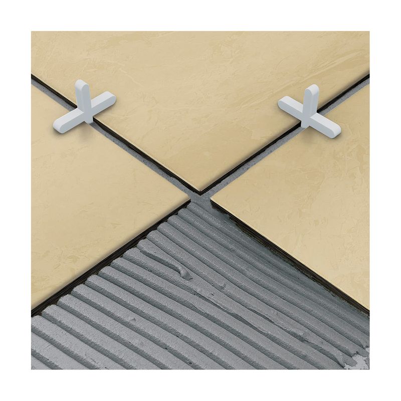 Separadores para azulejos plásticos 2 mm 200 piezas Truper, cuatro piezas blancas en forma de cruz sobre fondo blanco