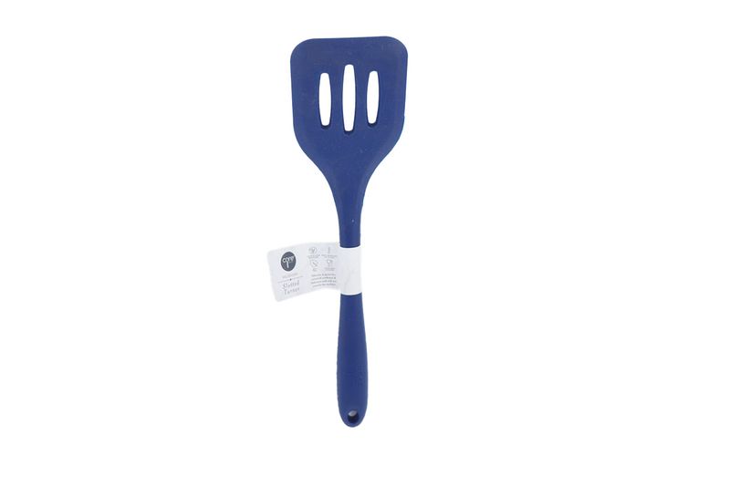 Cuchara ranura silicone colores sólidos Core Kitchen, vista frontal de color azul con etiqueta blanca en el mango