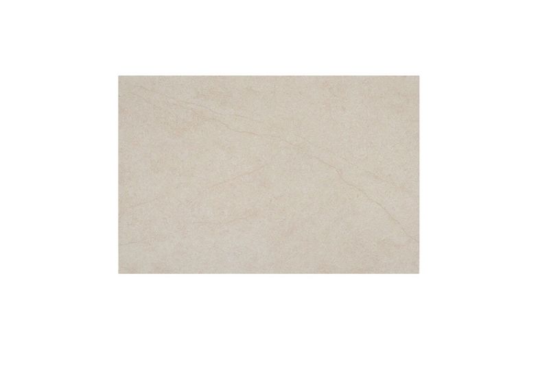 Azulejo Marsella 20 x 30 blanco Porcelanite, vista frontal de la pieza rectangular con textura marmolada
