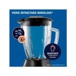 Licuadora vaso vidrio 1.5 l 800 w 6 vel gris Oster, acercamiento al vaso de vidrio con gráficos de capacidad y resistencia