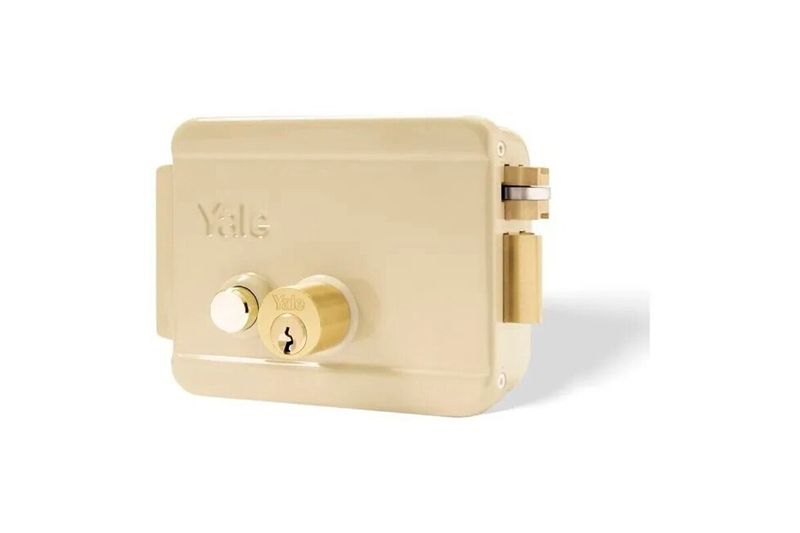 Kit cerradura parche eléctrica Yale con transformador, cable y botón derecha, vista frontal del transformador color crema