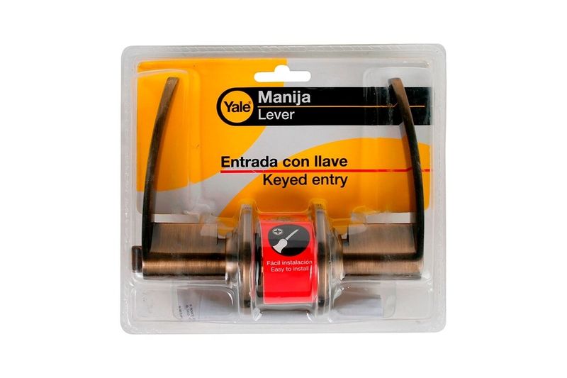 Cerradura manecilla entrada Dover Yale bronce antiguo, vista frontal del producto en su empaque blíster blanco y amarillo