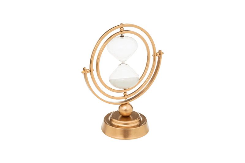 Reloj de arena decorativo metálico dorado 23 cm Atmosphera, vista frontal del reloj con arena blanca y soporte circular