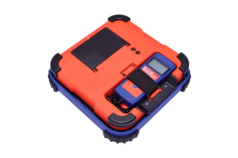 Báscula digital para cargar de refrigerante 220 lb Uniweld, guardada en su estuche rígido naranja y azul