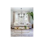 Luminaria colgante 5L E27 60W cromo Equinox, instalada en el techo de una sala con sofá blanco y mesa dorada