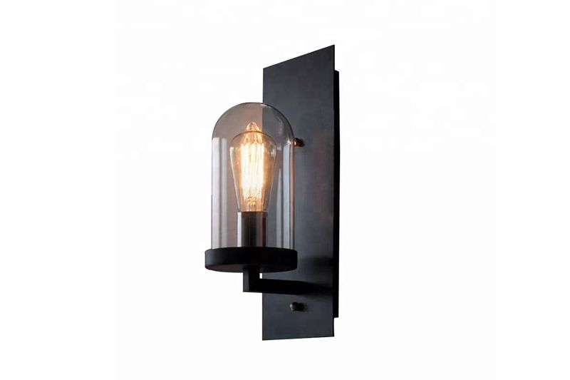 Luminaria de pared 1L E27 60W base negra y vidrio transparente Equinox, vista lateral con bombillo encendido